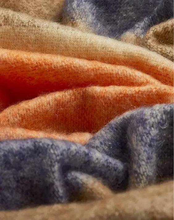 This image features two full fleece sheeps where Cushendale source the fleece to make woollen yarns